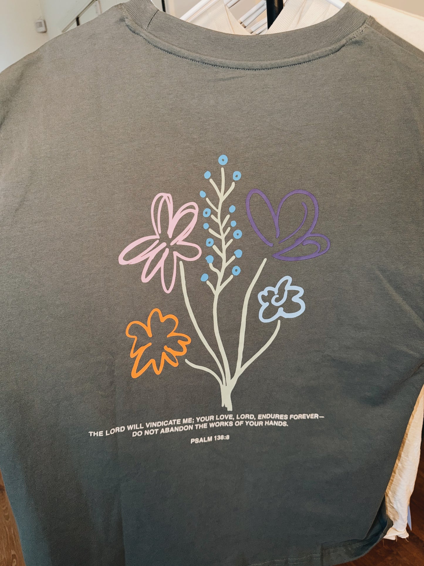 God’s Still Working Tee